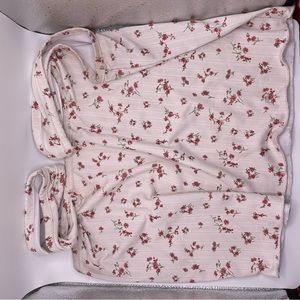 Cream tank top with red floral print